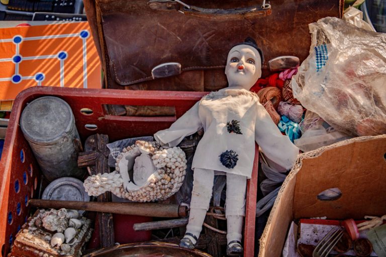 old doll in toybox
